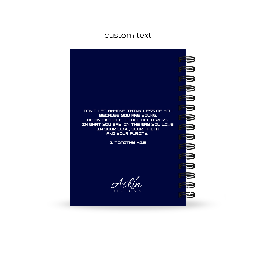 Navy blue Christian Journal with a Bible verse and 'Askin Designs' logo on a white background